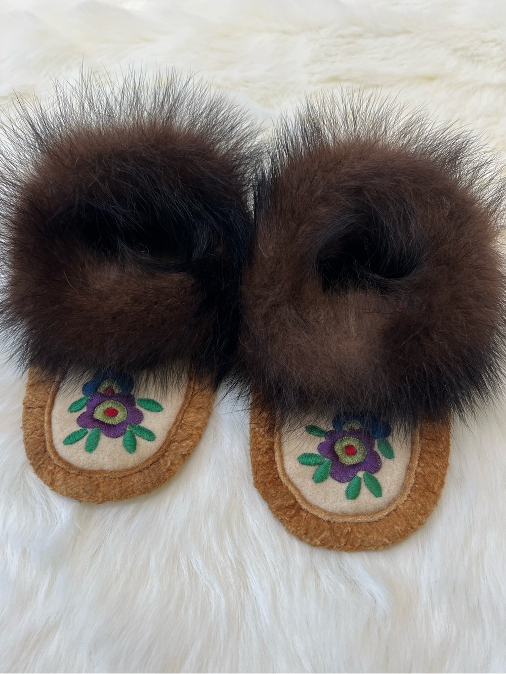 Handcrafted moccasins intricate floral beadwork ,a plush fur trim.kids 11-12